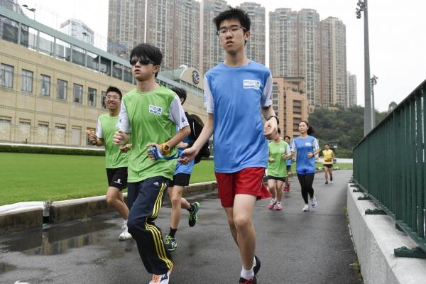 Some disadvantaged runners on Sunday's marathon will be guided across the finish line